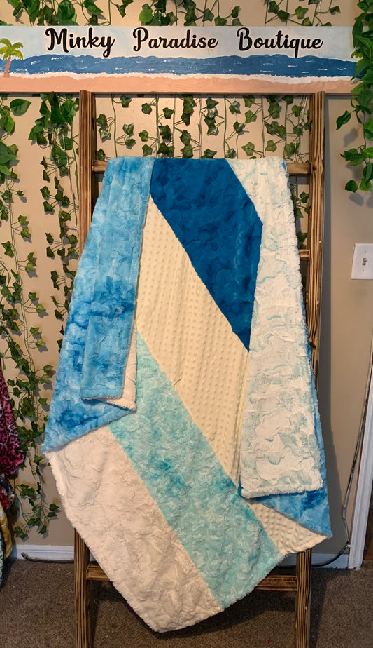 Strip fabrics-Salt water frosted hide, peacock hide, White dimple dots, Salt water galaxy, and white hide/Backing is Aquarius Galaxy